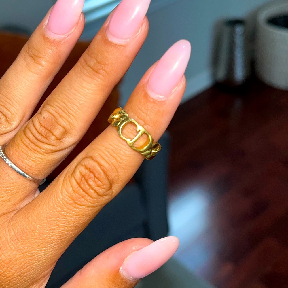 Gold CD christian Dior ring.